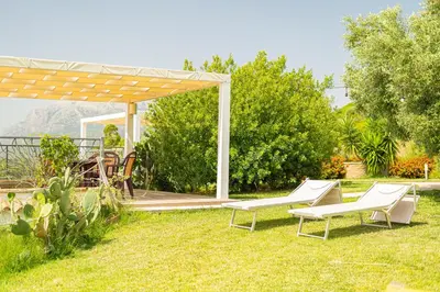 Giardino di HOTEL Essenza di Mirto