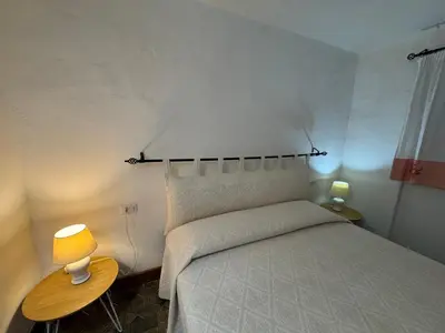 Letto o letti in una camera di Villa Fuli