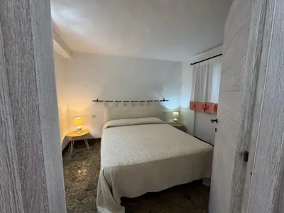 Letto o letti in una camera di Villa Fuli