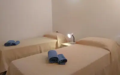 Letto o letti in una camera di Secret Garden