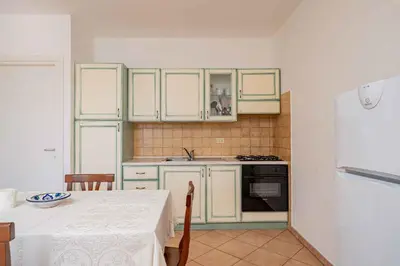 Cucina o angolo cottura di Holiday home in Monte Petrosu 42787