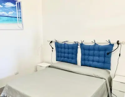 Letto o letti in una camera di ISS Travel, Panoramic Sea View Ticino - 1 bedroom apartment 1,5 km from the beach
