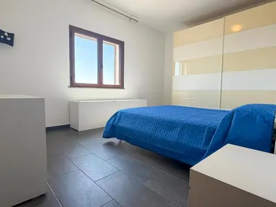 Letto o letti in una camera di Caletta Relax by Blu Sardinia