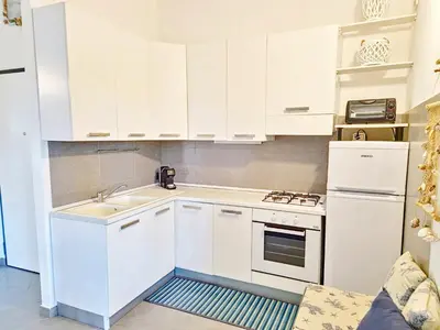 Cucina o angolo cottura di Cedro - Appartamento in residence con piscina condivisa