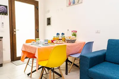 Area soggiorno di B&B FLOWERS