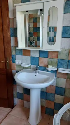 Bagno di Appartamento vista Parco Tepilora