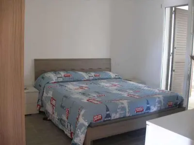 Letto o letti in una camera di Holiday home in Orosei Nuoro Provinz 39543