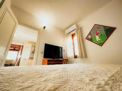 TV o dispositivi per l'intrattenimento presso Appartamento vicino al centro di Olbia
