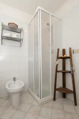 Bagno di Cala Liberotto-Raffinata taverna con camino