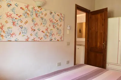 Letto o letti in una camera di Splendida Villetta Tavolara 1