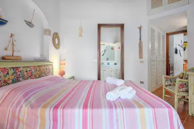 Letto o letti in una camera di Villa Miramar