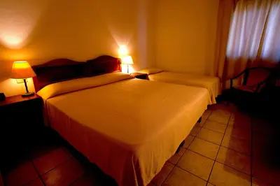Letto o letti in una camera di Hotel Moderno