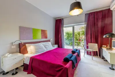 Letto o letti in una camera di Hotel Residence Hibiscus