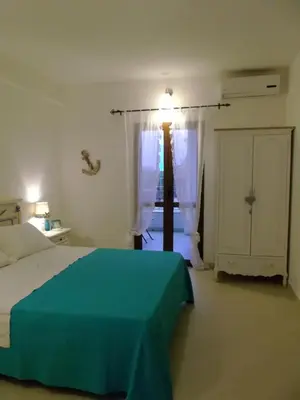 Letto o letti in una camera di L'Ancora suite
