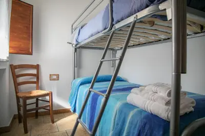 Letto o letti in una camera di Country House Muristene