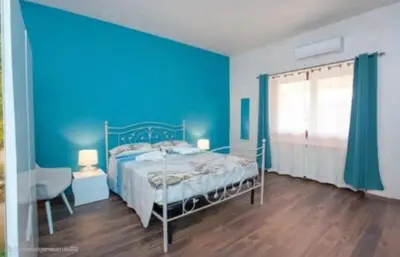 Letto o letti in una camera di LA SIESTA B&B