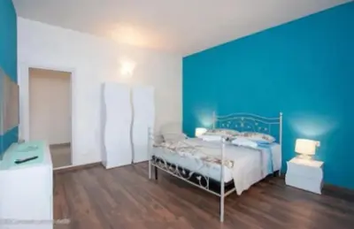 Letto o letti in una camera di LA SIESTA B&B