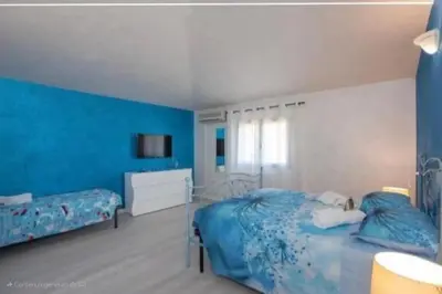 Letto o letti in una camera di LA SIESTA B&B