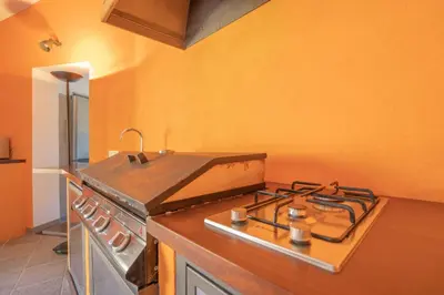 Cucina o angolo cottura di Villa Panoramica Porto Istana