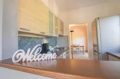 Cucina o angolo cottura di Villa Panoramica Porto Istana