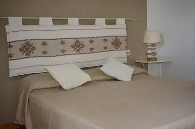 Letto o letti in una camera di Villa con Splendido Giardino e Vista Mare a Osseddu - Olbia