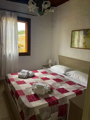 Letto o letti in una camera di K&K House