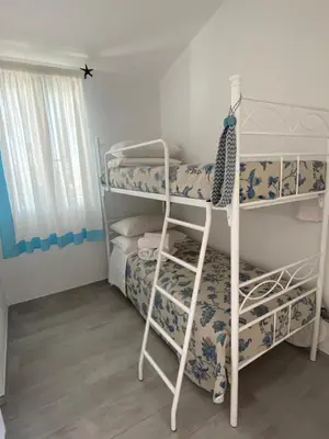 Letto o letti in una camera di La casa sull’acqua