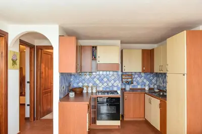 Cucina o angolo cottura di Appartamento Mughetto con A/C
