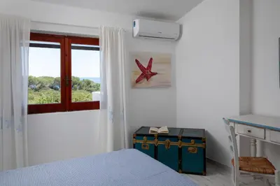 Letto o letti in una camera di Casa dell'Asfodelo by Wonderful Italy