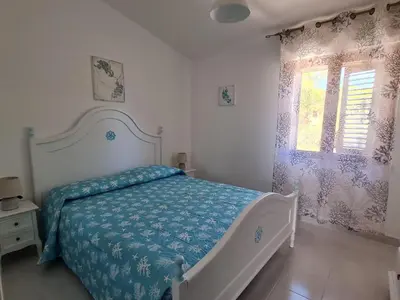Letto o letti in una camera di Casa Vacanza Boi-Dessena