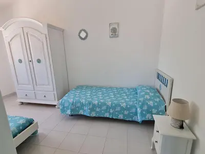 Letto o letti in una camera di Casa Vacanza Boi-Dessena