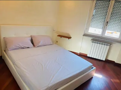 Letto o letti in una camera di Sunny rooftop loft with gorgeous views of Olbia