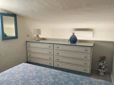 Letto o letti in una camera di Villetta Luna