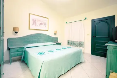 Letto o letti in una camera di Club Hotel Marina Seada Beach