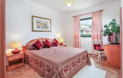 Letto o letti in una camera di Quadri