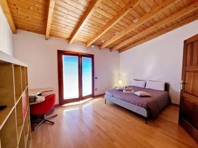 Letto o letti in una camera di La casa in centro