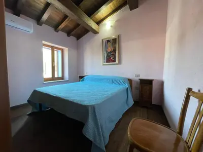 Letto o letti in una camera di Nel Cortile della Casa di Carta, due Singole Unità