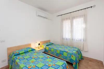 Letto o letti in una camera di Peschiera 1