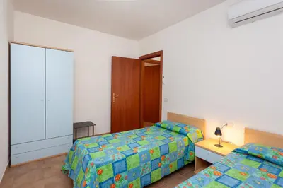 Letto o letti in una camera di Peschiera 1
