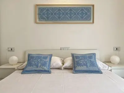 Letto o letti in una camera di Cocciu D'Amuri