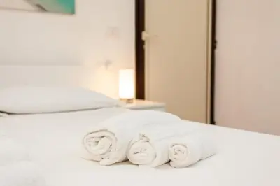 Letto o letti in una camera di San Teodoro - Civico 35
