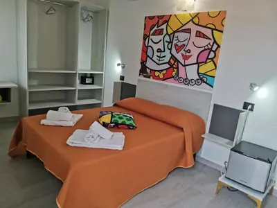 Letto o letti in una camera di Wonderland