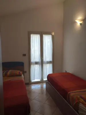 Letto o letti in una camera di Appartamento Mirto
