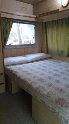 Letto o letti in una camera di Villaggio Camping Calapineta