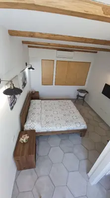 Letto o letti in una camera di Li Petri Manni