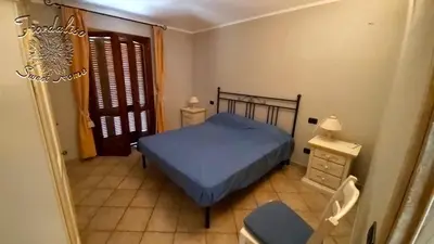 Letto o letti in una camera di Fiordaliso Sweet Home