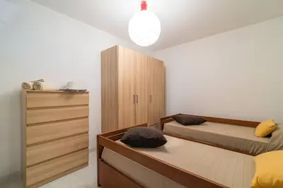 Letto o letti in una camera di AffittaSardegna-Villa Gerani