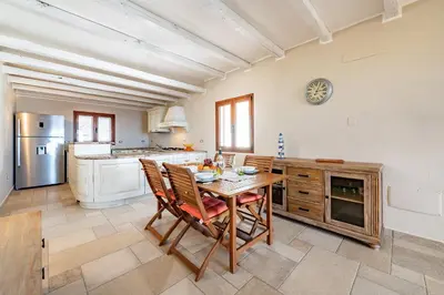 Cucina o angolo cottura di AffittaSardegna-Casa Vedetta