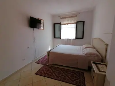 Letto o letti in una camera di La Caletta Vista mare giardino