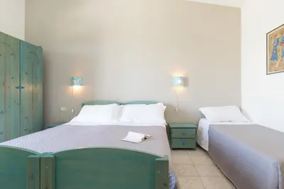 Letto o letti in una camera di S'Enis Monte Maccione